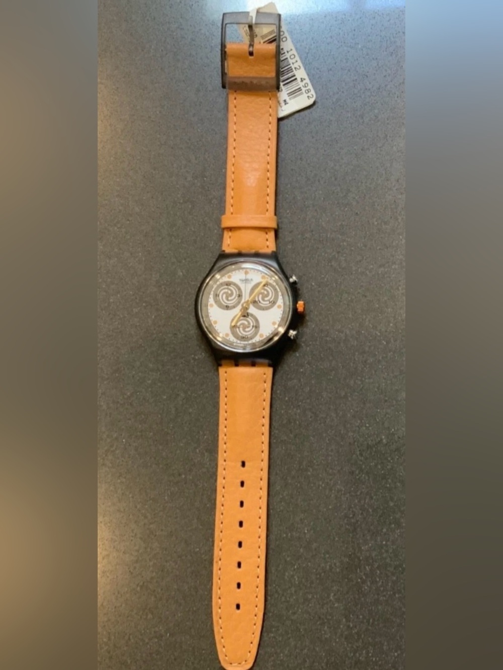 Swatch unisex Tan Leather Strap Watch with Silver Decorative Dial